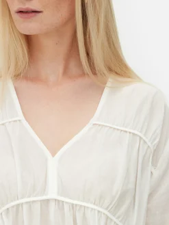 Blusa Drapeada De Gasa Con Vuelo