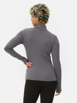 Camiseta De Manga Larga Con Cuello Vuelto