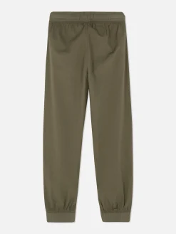 Joggers De Popelina Con Bajos Ajustados