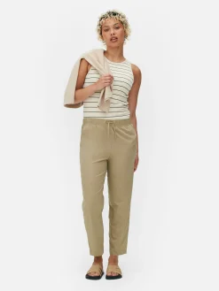 Joggers De Popelina Con Pernera Cónica