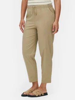 Joggers De Popelina Con Pernera Cónica