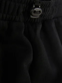 Joggers Estilo Cargo Con Bajos Ajustados