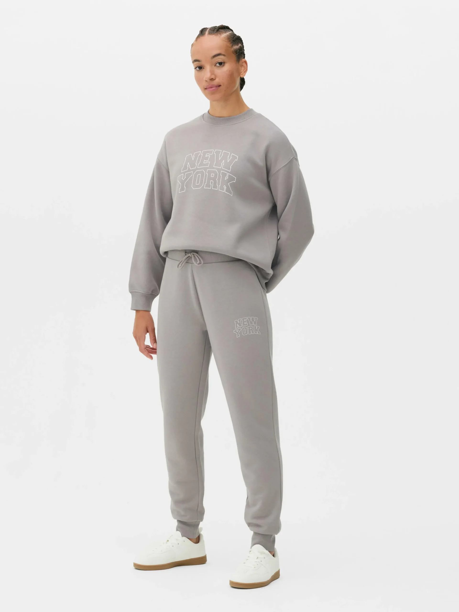 Pantalones De Chándal Pitillo Con Estampado Gráfico