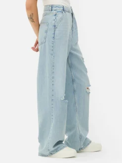 Pantalones Vaqueros De Pernera Ancha Desgastados