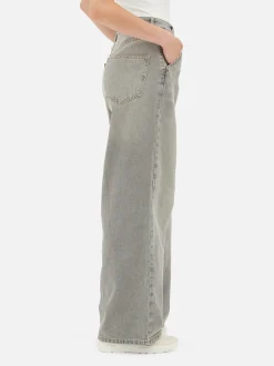 Pantalones Vaqueros De Pernera Ancha Desgastados