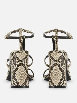 Sandalias En Con Tira En «T» Y Tacón De Rita Ora