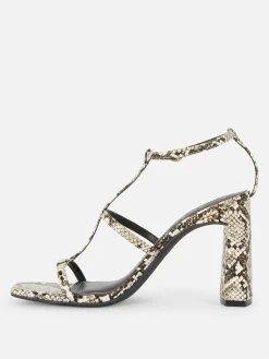 Sandalias En Con Tira En «T» Y Tacón De Rita Ora