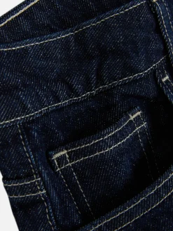 Vaqueros De Pernera Ancha Con Bajos Vueltos